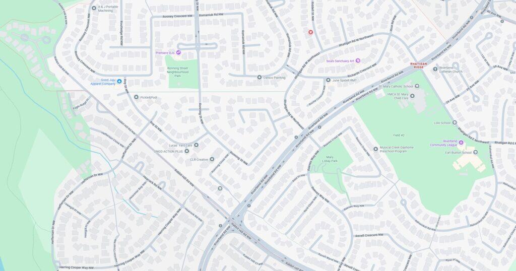 Detailed street map highlighting parks, schools, and recreational areas in Riverview NW neighborhood.