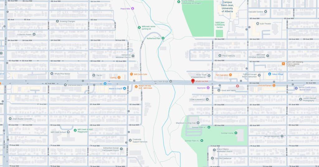 Detailed map of Mill Creek area with parks, schools, and local landmarks in Edmonton.