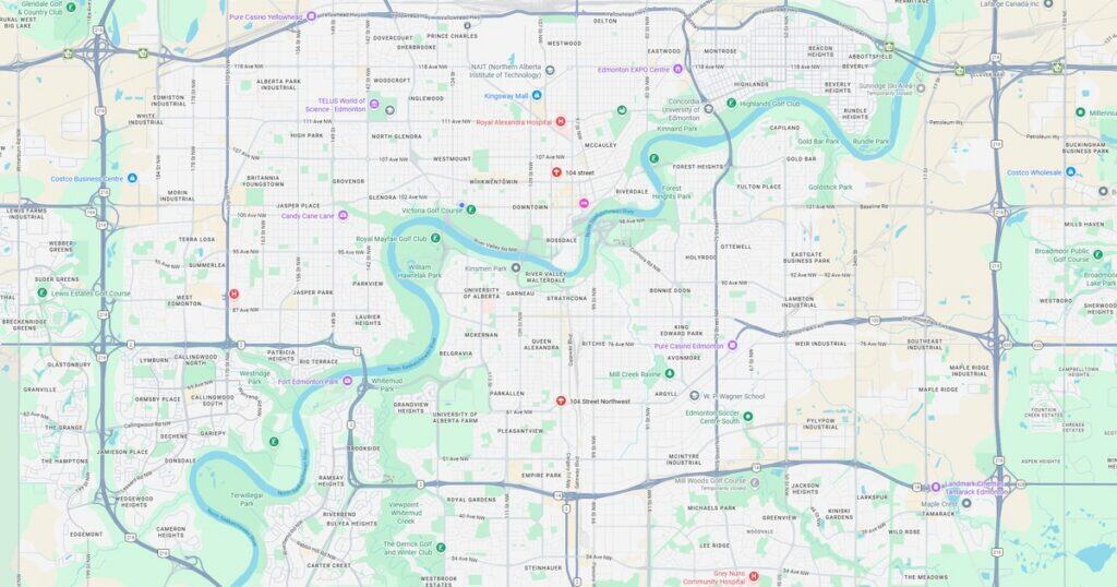 Scenic riverfront park with walking trails, lush greenery, and city skyline views in the downtown area. Perfect for outdoor activities, relaxation, and enjoying nature in an urban setting.