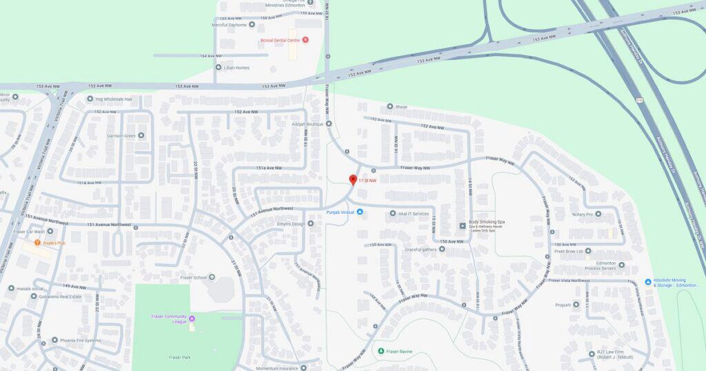 Map showing a suburban neighborhood with streets, parks, and a nearby highway, highlighting local residential areas and green spaces.