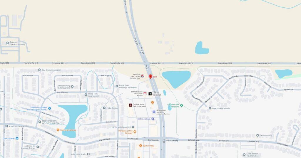 A detailed map of a suburban neighborhood showing lakes, streets, and residential areas, highlighting local landmarks and infrastructure.
