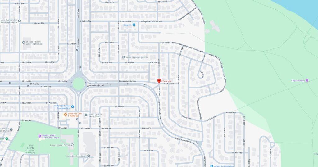 Map of a suburban residential neighborhood showing streets, houses, and green spaces, with a focus on community layout and accessibility.