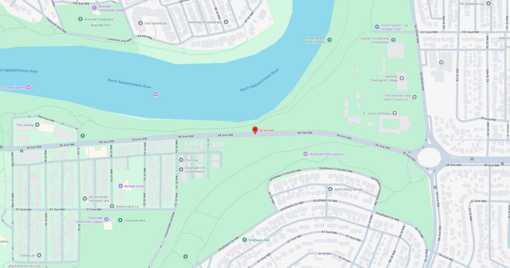 A detailed map showing Sunset Park along with the adjacent river and surrounding residential areas, highlighting pathways, green spaces, and park amenities.