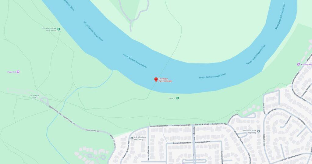 Scenic view of the Potomac River flowing through Riverbend Park with lush green surroundings and walking trails.
